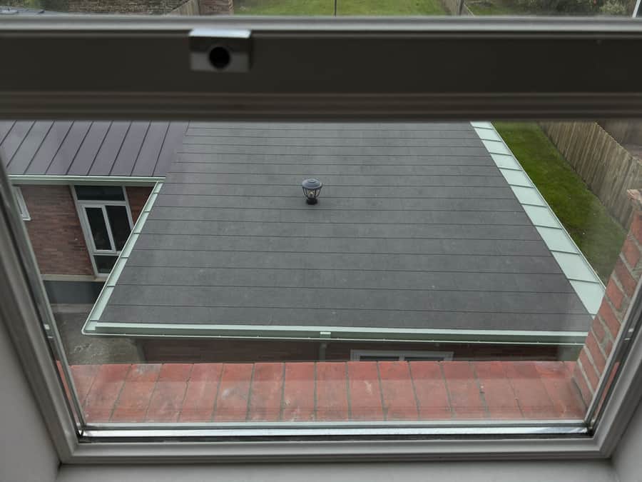 New flat roof covering on a single-storey rear extension in Oadby, seen from an upstairs window
